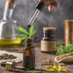 cannabis-essential-oil-container-with-cannabis-leaves-cannabis-seeds-scaled